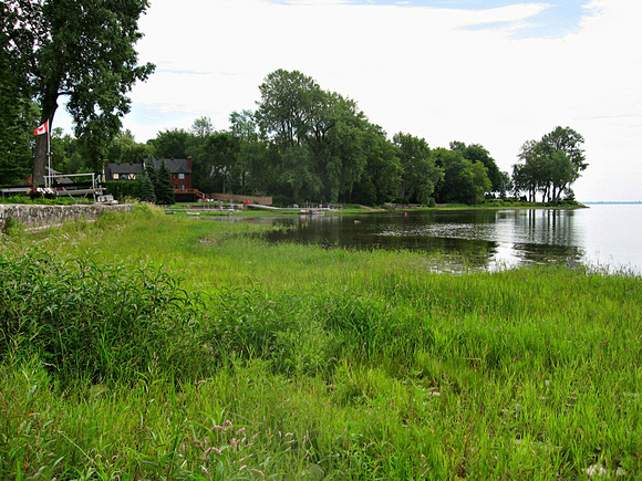 A couple of month later, the water levels are still low, the shore is overgrown with grass